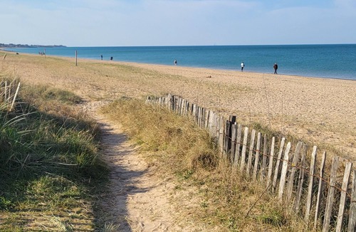 Lion-sur-Mer Apartment | Seaside studio with bikes and garden
