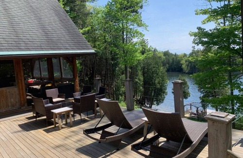 Colchester Apartment | Secluded and lavish 6BDR lakehouse in private cove with outdoor (year round) hot tub & steam sauna