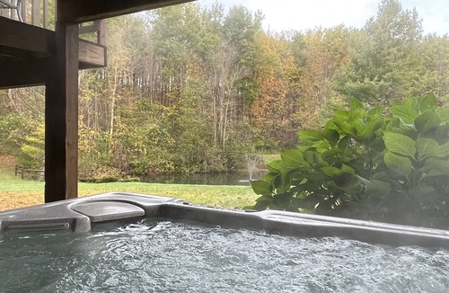 Rodman Apartment | Secluded Apartment Overlooking Ponds with Hot Tub, Fireplace and Game Room!