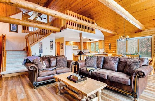 Friendship House | Secluded, dog-friendly home with tree-lined view, firepit, fireplace, & deck