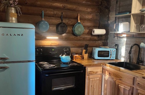 Paluxy Cabin | Secluded Escape with a hot tub, surrounded in nature