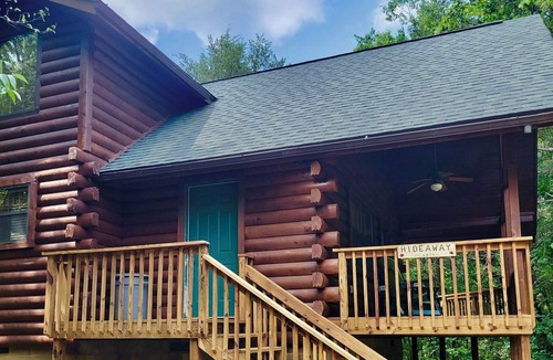 Eureka Springs Cabin | Secluded Hideaway Cabin boasting Wrap-Around Deck and Jacuzzi for two! Trail & Cave on property!