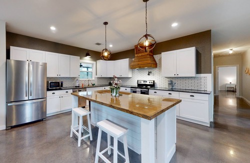 Fischer House | Secluded home with firepit, gas grill, central AC, game room, W/D