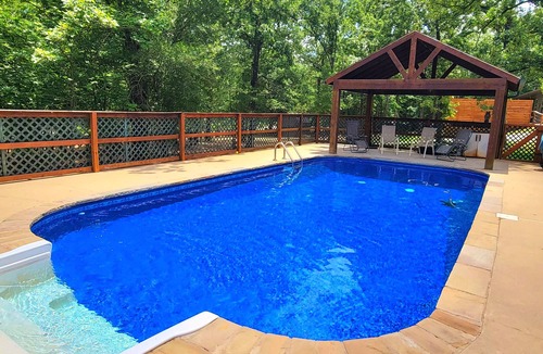 Yantis Cabin | Secluded Lakefront Cabin with Pool and Private Boat Ramp