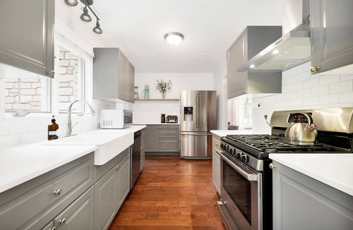 Warkworth House | Secluded modern house, 5 forested acres, running stream, hot tub, game room