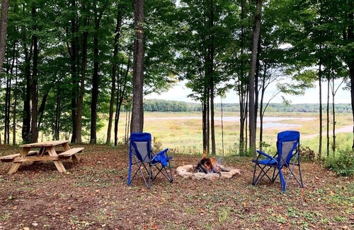 Waterford Township RV Rental | Secluded Overlook Solo Campsite