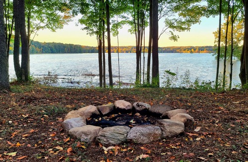 Waterford Township RV Rental | Secluded Overlook Solo Campsite