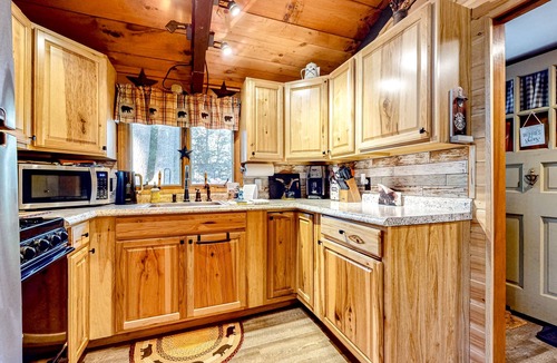 Center Conway House | Secluded, rustic, dog-friendly home with firepit, deck & woodstove