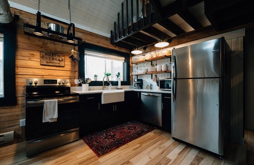 Ferryville Cabin | Secluded Rustic-Modern Log Cabin w/Hot Tub, Private Creekside Escape
