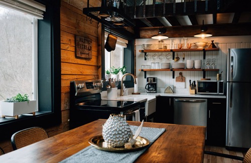 Ferryville Cabin | Secluded Rustic-Modern Log Cabin w/Hot Tub, Private Creekside Escape