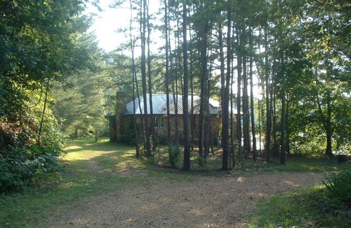 Salem House | Secluded Stone Housen50' deck overlooking Beaver Lake on Ozark Mushroom Farm!