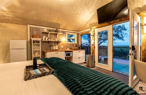 Townsend House | Secluded Treehouse Tent Retreat on the Marsh with Outdoor Dining, Grilling Gear, Games, Views in Townsend, Georgia