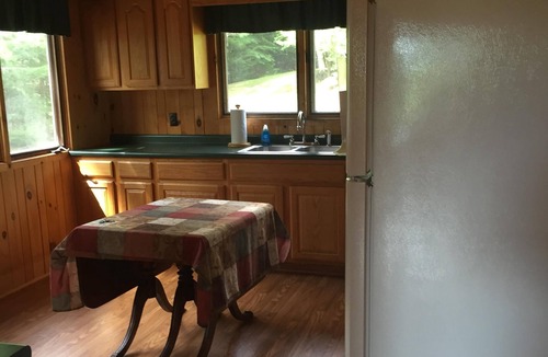Saranac Lake House | Secluded Waterfront Log Home with Amazing Mountain Views on Otter Slide