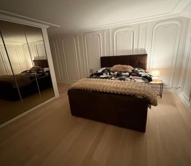 Alterswil Villa | Seeliwood cheminée et confort région Schwarzsee