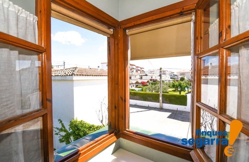 Comarruga House | Semi-detached house with barbecue and communal area with swimming pool, 500m from the beach.
