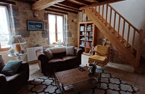 Barbaste Cottage | Semi-detached stone cottage on property with pond, bucolic setting