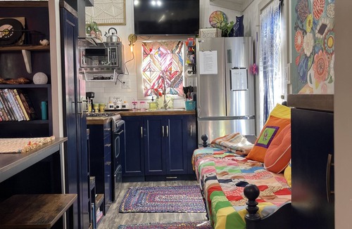Sweetwater House | “SERENDIPITY” a boho inspired tiny home on wheels in country setting