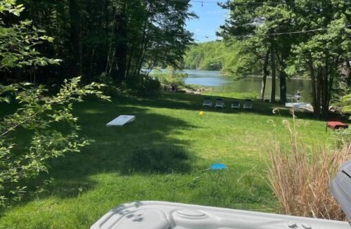 Woodstock House | Serene 4-acre estate on private lake with hot tub