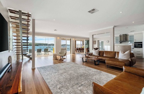 Point Clare House | Serene By Coast Hosting | Relax in the Heated Spa