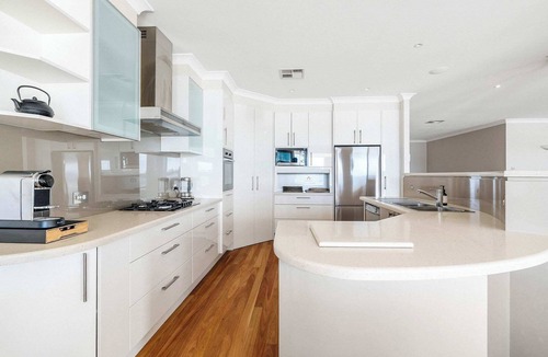 Point Clare House | Serene By Coast Hosting | Relax in the Heated Spa