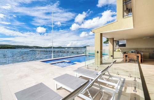 Point Clare House | Serene By Coast Hosting | Relax in the Heated Spa