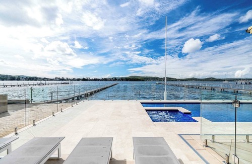 Point Clare House | Serene By Coast Hosting | Relax in the Heated Spa