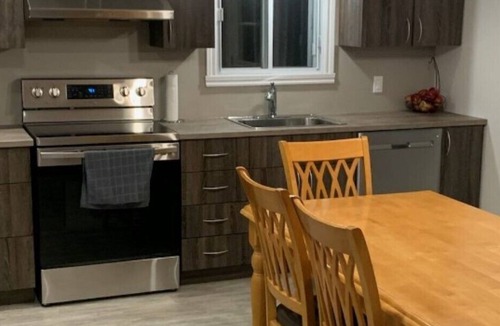 Notre-Dame-de-Pontmain Cottage | Serene waterfront 4 bdrm/2 bath cottage with wifi/hot tub/deck/bbq/firepit/dock