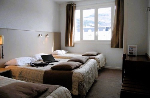 Lourdes Hotel | Serene Family Suite with Ample Space & Balcony - Free Parking