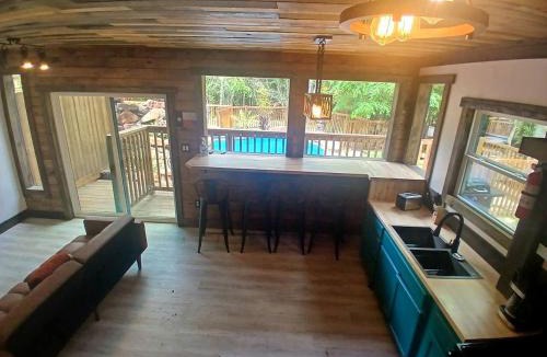 Plantersville House | Serene Forest Retreat Home with Waterfall Pool, Creek & canoe Access near Houston, Grimes County, Texas