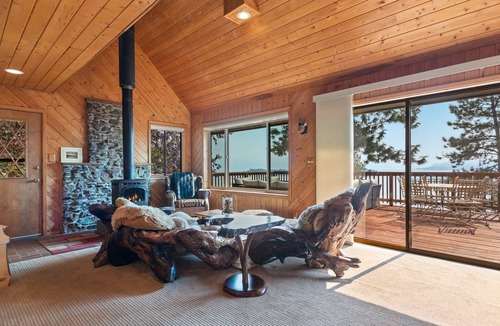 Hope House | Serene lake-view retreat with deck, grill, firepit, & fireplace