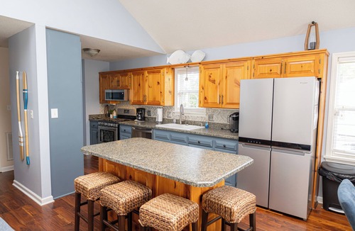 Henrico House | Serene Lakefront Escape with Sunset Views, Private Boathouse, and Endless Fun!
