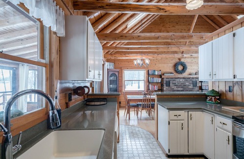 Big Rapids Cottage | Serene Lakefront Log Estate: 4-Acre Private Retreat with Sauna
