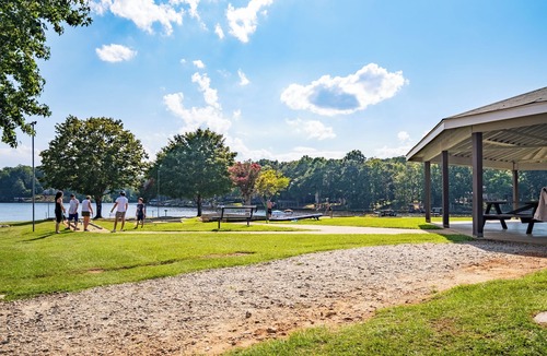 Louisburg House | Serene Lakeside Oasis: Relax and Recharge