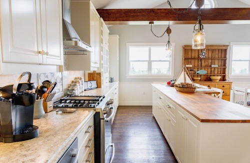 Malpeque House | Serene Malpeque Bay Cottage with Deck Views, Beach Access & Modern Comfort