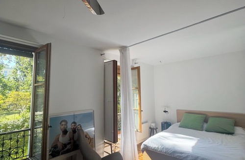 Charonne Apartment | Serene park view apartment in Paris, perfect for your getaway