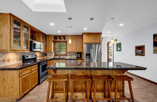 Kingsland House | Serene Riverfront Sanctuary: Private Boat Dock and Hill Country Views