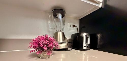 Rampart Village Apartment | Serene Stay with Pool Access & Balcony