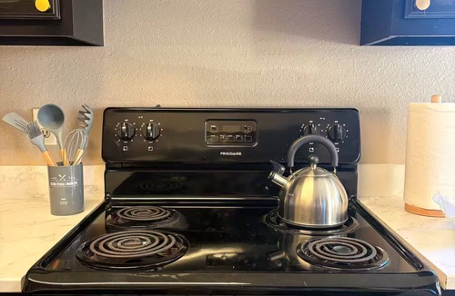 San Angelo House | Serene under the trees pet friendly haven