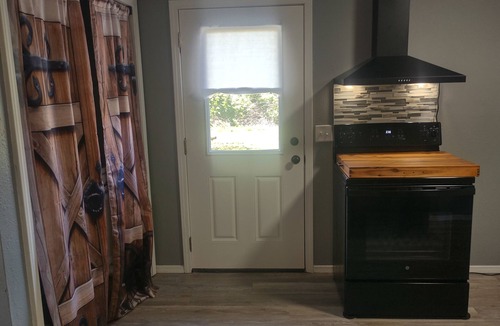 Cushing House | Serenity's Sanctuary in this quiet, peaceful 2 bdr 1 bath bungalow. Pet friendly
