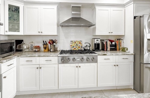 Milford Condo | Setting Sun Waterfront Retreat on Hillside