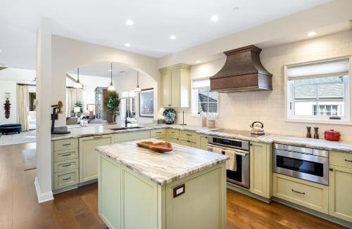 Old Towne House | Seventh Shore Stylish Seal Beach Home w Elevator Fireplace Bold Design