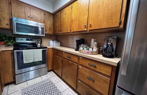 Buchanan Dam House | Shaded riverfront getaway. Dog friendly