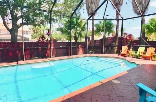 Kirkman South House | Shadow Bay Luxe Home with a Private Screened Pool near Universal Studios.