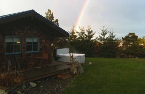 Friday Harbor Apartment | Shared hot tub with meadow view