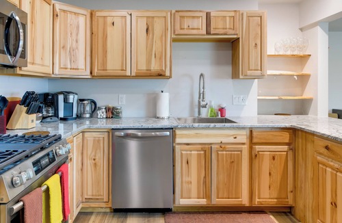 University Area Apartment | Shared Yard + Fire Pit: Airy Anchorage Apt!