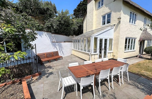 Thurlestone Cottage | Shepherds Patch Is A Large Thatched Cottage In Thurlestone with a parking space.