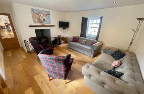 Newtonmore House | Sherrabeg Cottage