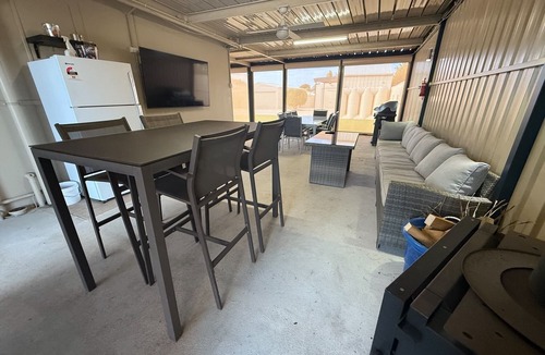 Dalrymple House | Shore Beats Work - Large entertaining area! Dog friendly!