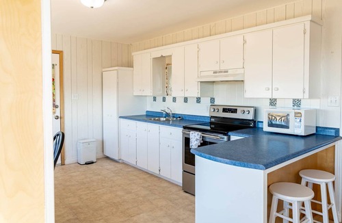 Saint Peters Bay House | Shore to Sky Oceanfront Escape with Sunroom, Stunning Views & Beach Access