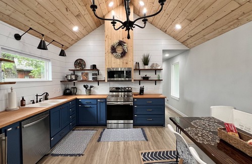 Cookson Cabin | SHORT WALK TO WATER & NESTLED IN THE TREES THIS BEAUTIFUL CABIN HAS LAKE VIEWS